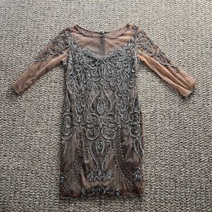 Size 8 grey beaded bridesmaid dress. Only worn once